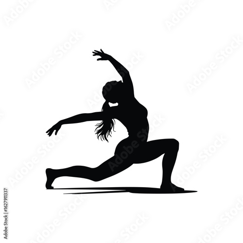 Silhouette of a woman performing a graceful yoga pose
