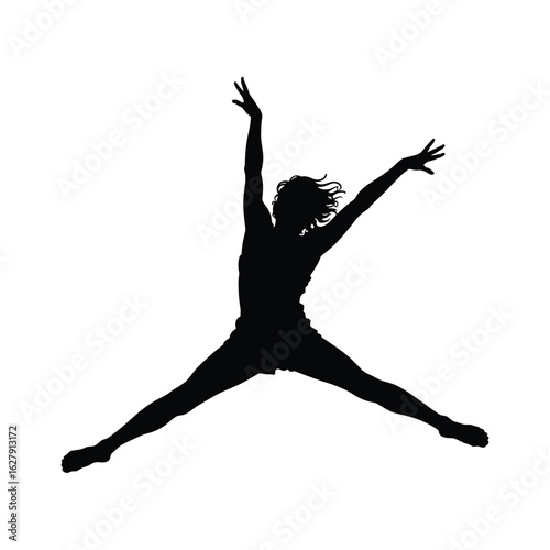 Silhouette of a dancer in mid air with arms and legs outstretched