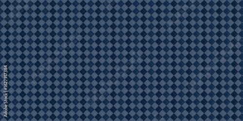 Seamless pattern with a harlequin or diamond check pattern in dark blue with white dots on a blue background