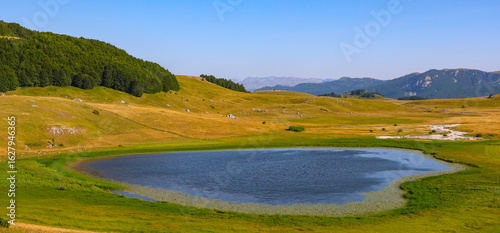 Summer scenic landscape of Poscensko Lake in Durmitor National Park in Montenegro, Europe