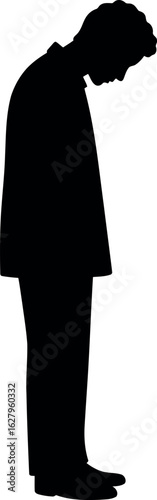 Sad man silhouette head down emotional distress