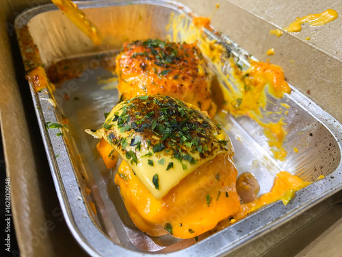 Takeaway Concept Shumay Dimsum with Japanese Mentai Sauce on Brown Package.