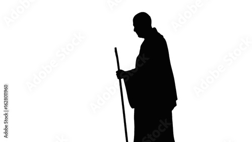 Silhouette of a Monk with a Staff figure person