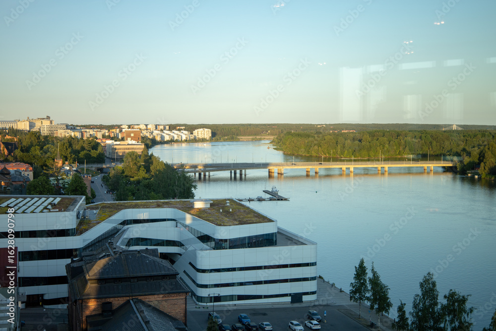 Naklejka premium Downtown Umea and the Ume River in Vasterbotten, Sweden. Photographed on a Clear Summer Day, July 18, 2025