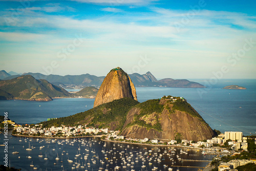 Rio de Janeiro, RJ, Brazil, 08/03/2025 - Sugar Loaf and Urca hills and Botafogo cove at sunset, seen from the Dona Marta viewpoint