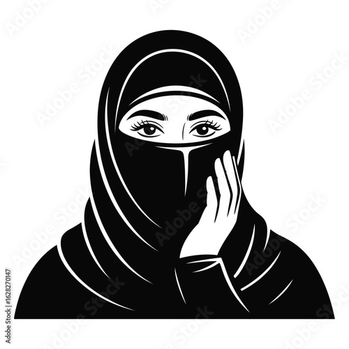 Close up portrait of a woman wearing a black niqab with her hand gently touching her face
