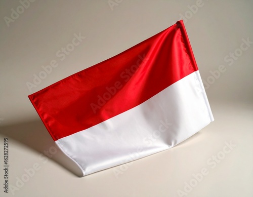 Wallpaper Mural A red and white bicolor flag gently billows, displayed against a neutral background. Torontodigital.ca