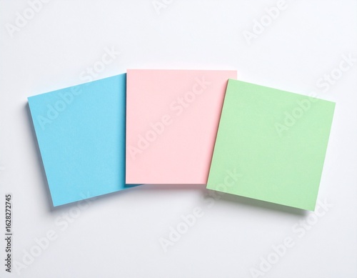 Wallpaper Mural Three colorful sticky notes arranged on a plain white background. Torontodigital.ca