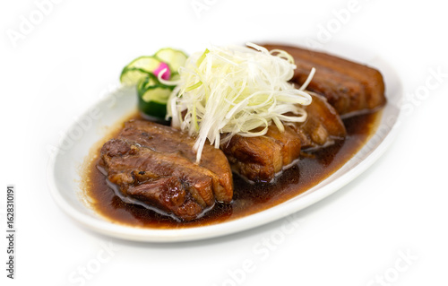 Braised Pork belly on top with Spring onion