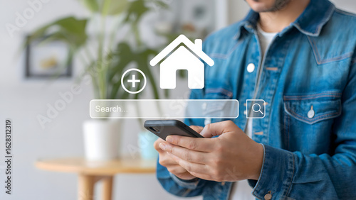 Man uses smartphone searching for dream home online with interactive house icon