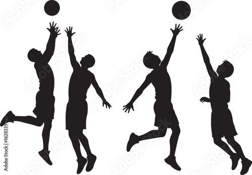 Four basketball players jumping for the ball silhouette