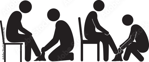 Four figures in a group sitting and kneeling silhouette