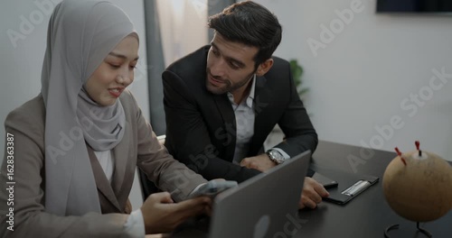 Business concept of 4k Resolution. Multiethnic businessmen playing with mobile phones in the office.