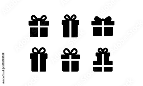 Set of black gift box icons with ribbon bows in silhouette style