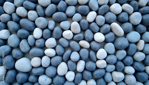A visually appealing composition of blue and white pebbles creating a harmonious pattern.