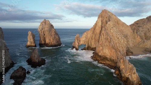 Drone flight over the Arch of Cabo San Lucas, the tip of Baja California Sur, Mexico.