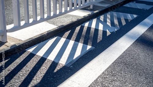 Crossing Shadows on Asphalt Pavement with Striped Pattern