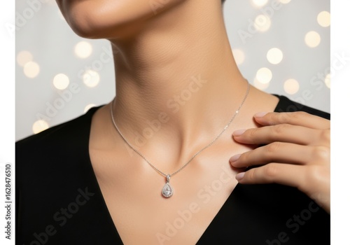 Elegant diamond pendant necklace on a womans neck