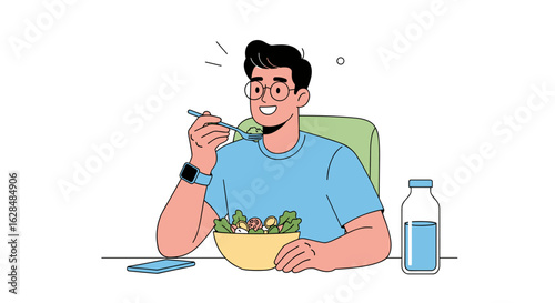 Man enjoying a healthy salad meal during lunch break with a refreshing drink