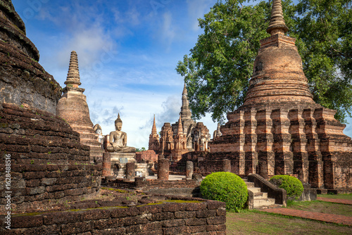 View of Wat Mahathat temple in Sukhotai Historical Park, Thailand in daylight