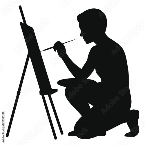 Artist Silhouette Painting: Kneeling painter with easel and brush, symbolizing creativity, focus, art creation, inspiration, and the artistic process.