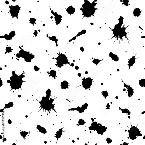 Seamless black ink splatter pattern on white background for design and abstract art projects and backgrounds