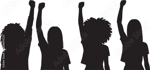 Four women with raised fists in silhouette