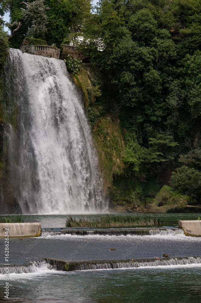 Naklejka premium The Cascata Grande is formed by the left arm of the Liri River and is approximately 27 meters high:one of the few waterfalls to be found in the historic center of a city, unique in Italy and in Europe
