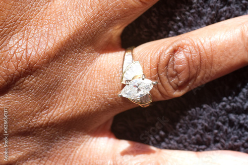 Hand with engagement ring