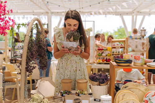 Wallpaper Mural Female Artisan Selling Dried Flowers, Herbal Teas, and Handmade Ceramics at Summer Outdoor Craft Market Torontodigital.ca
