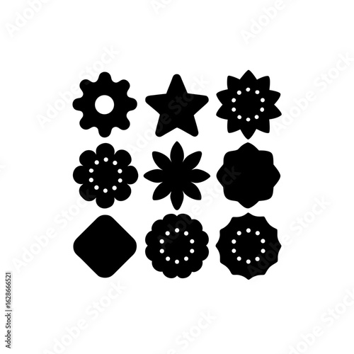Black cookie cutters on white background baking kitchenware