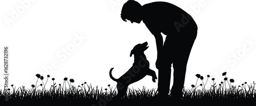 Silhouette of person with dog, affectionate moment, pet interaction, grass and flowers, black white nature scene, bonding, companionship