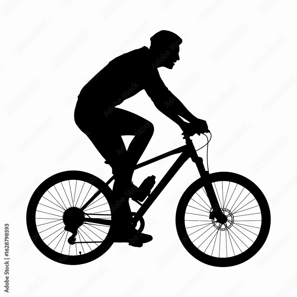 Fototapeta premium Bicyclist Silhouette in Motion on a Mountain Bike