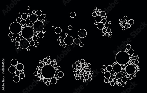 Set of abstract circle outline clusters on black background. Minimalist geometric vector design. Biology concept.