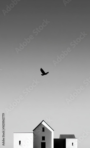 Minimalist composition silhouetted bird flies over a white, simple house against a gradient sky