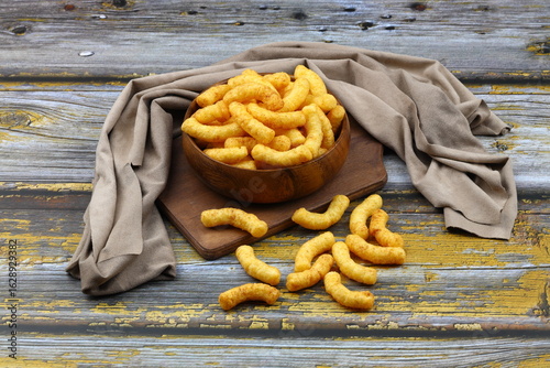 Puffed corn peanuts snacks isolated on white background.