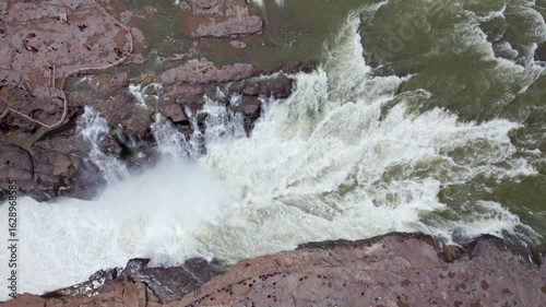Drone view of Hukou Waterfall in Shanxi Province, China, it is a magnificent sight of the surging Yellow River water, filled with energy and awe inspiring，4k slow motion footage aerial view. 