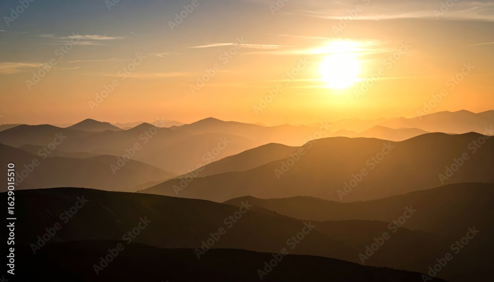 Obraz premium Breathtaking sunset over majestic mountains, a stunning landscape photo.