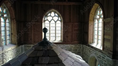 Wooden interior with stained glass windows