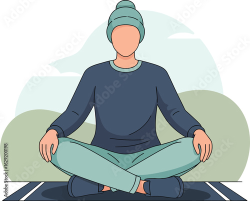 Person in a beanie and sweater meditating in a lotus position on a mat.