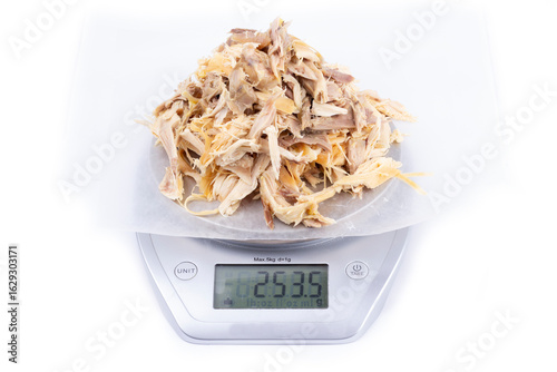 Chicken Meat From One Laying Hen on Scale in Grams Head On Isolated on White