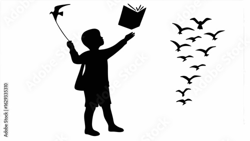 Silhouette of a boy with a bag releasing a book while holding a bird kite and watching birds fly