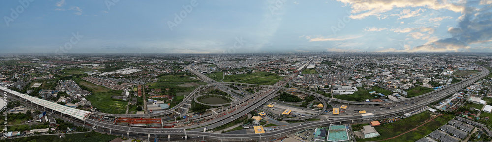 Fototapeta premium Panorama of a city highway with cars on the way