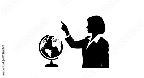 Silhouette of a businesswoman pointing at a globe, indicating a location.