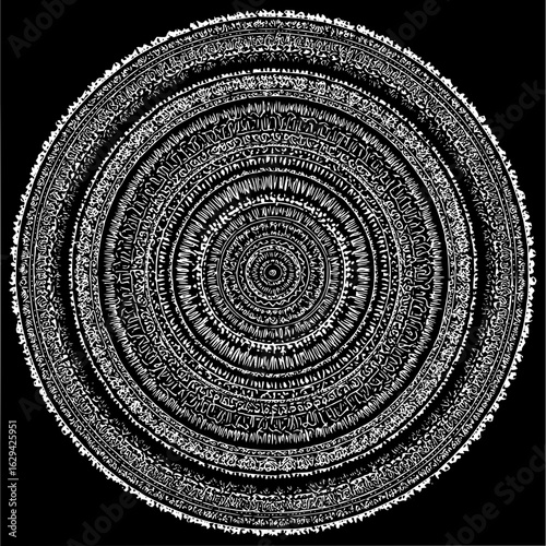 Detailed circular mandala design with intricate patterns and radial symmetry in black and white color scheme