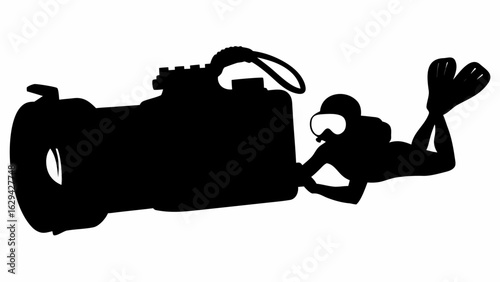 Silhouette of a scuba diver with flippers holding a large underwater camera in a monochrome image