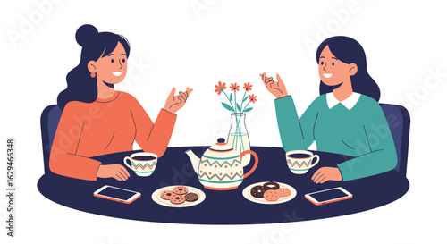 Two friends enjoying coffee and conversation at a cafe with cookies and donuts on the table