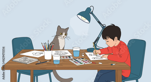 Young boy drawing with his cat companion providing moral support