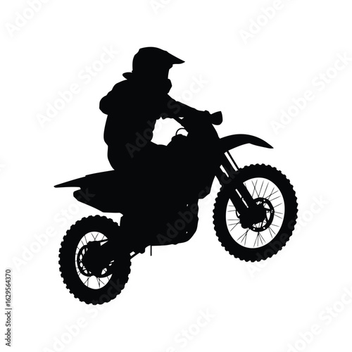 Silhouette of a motocross rider performing a wheelie on a dirt bike isolated on white background