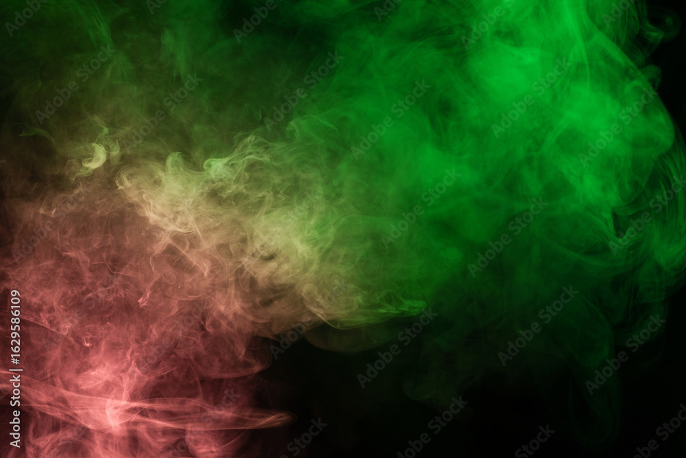 Obraz premium Green and pink steam on a black background.